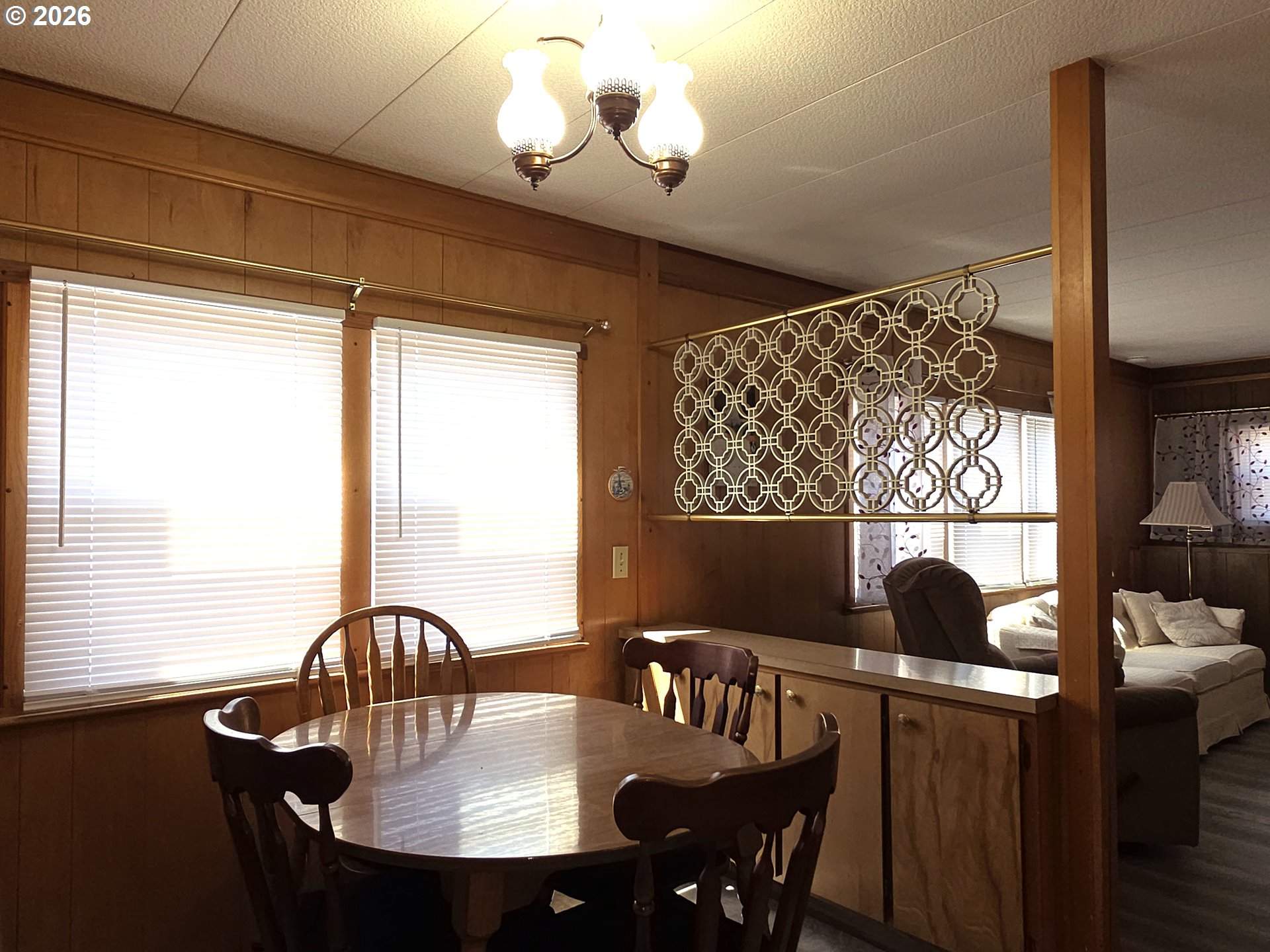 3203 Southeast Vineyard Road, Unit 44 Milwaukie, OR 97267 - Photo 14 of 38 a view of a dining room with furniture window and outside view