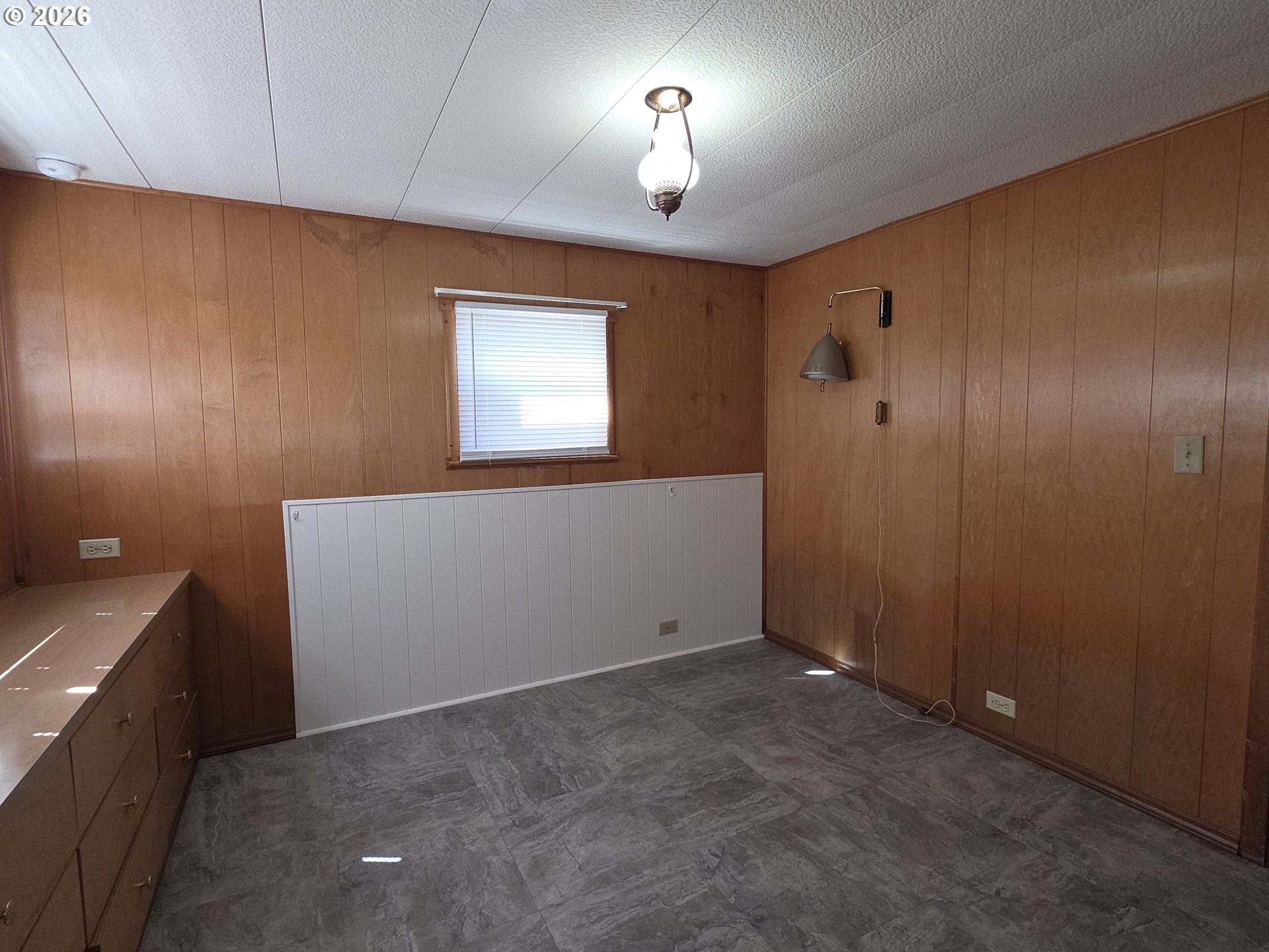 3203 Southeast Vineyard Road, Unit 44 Milwaukie, OR 97267 - Photo 21 of 38 a view of an empty room and window