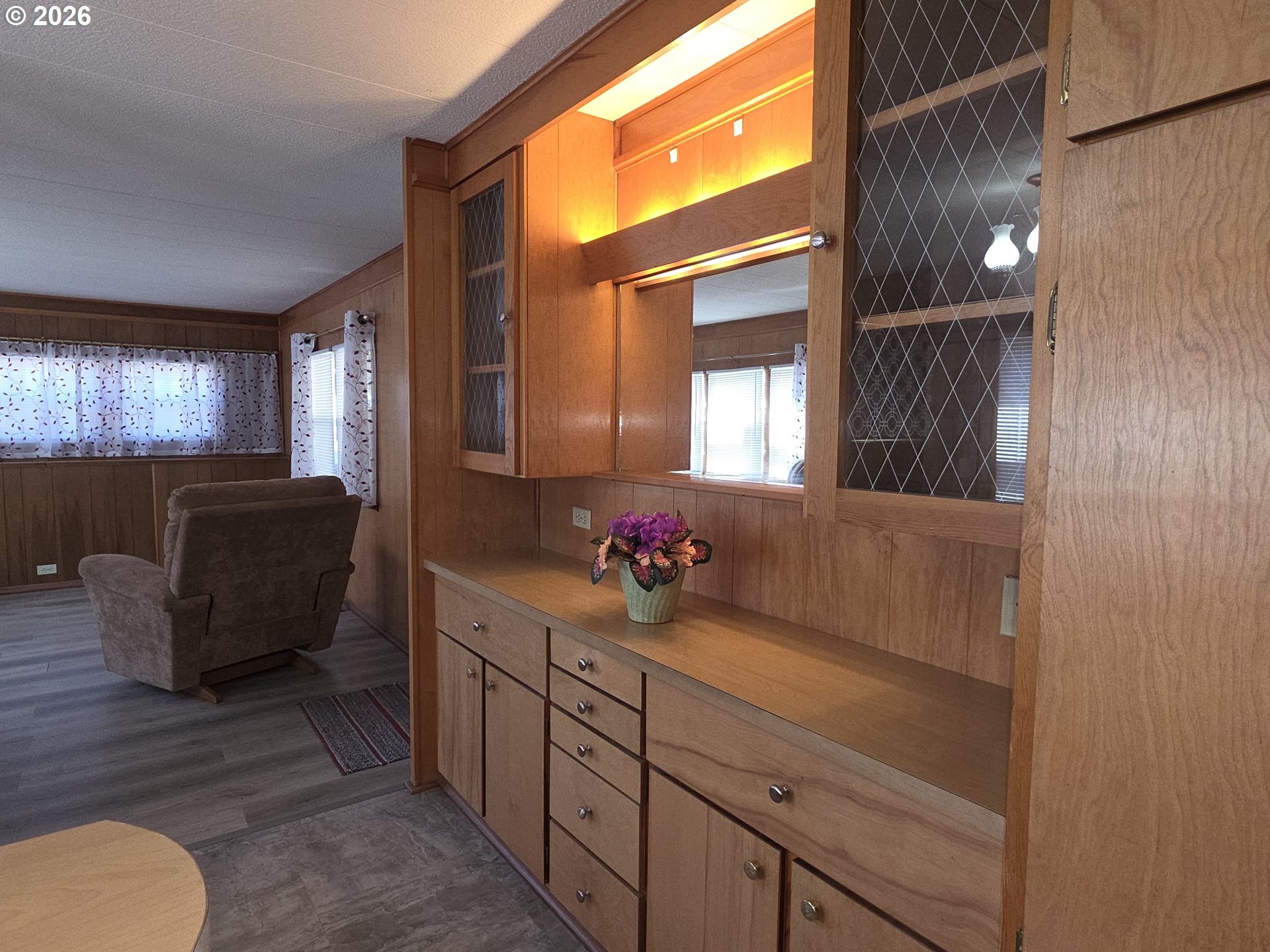 3203 Southeast Vineyard Road, Unit 44 Milwaukie, OR 97267 - Photo 31 of 38 a bathroom with a mirror a sink and a large mirror