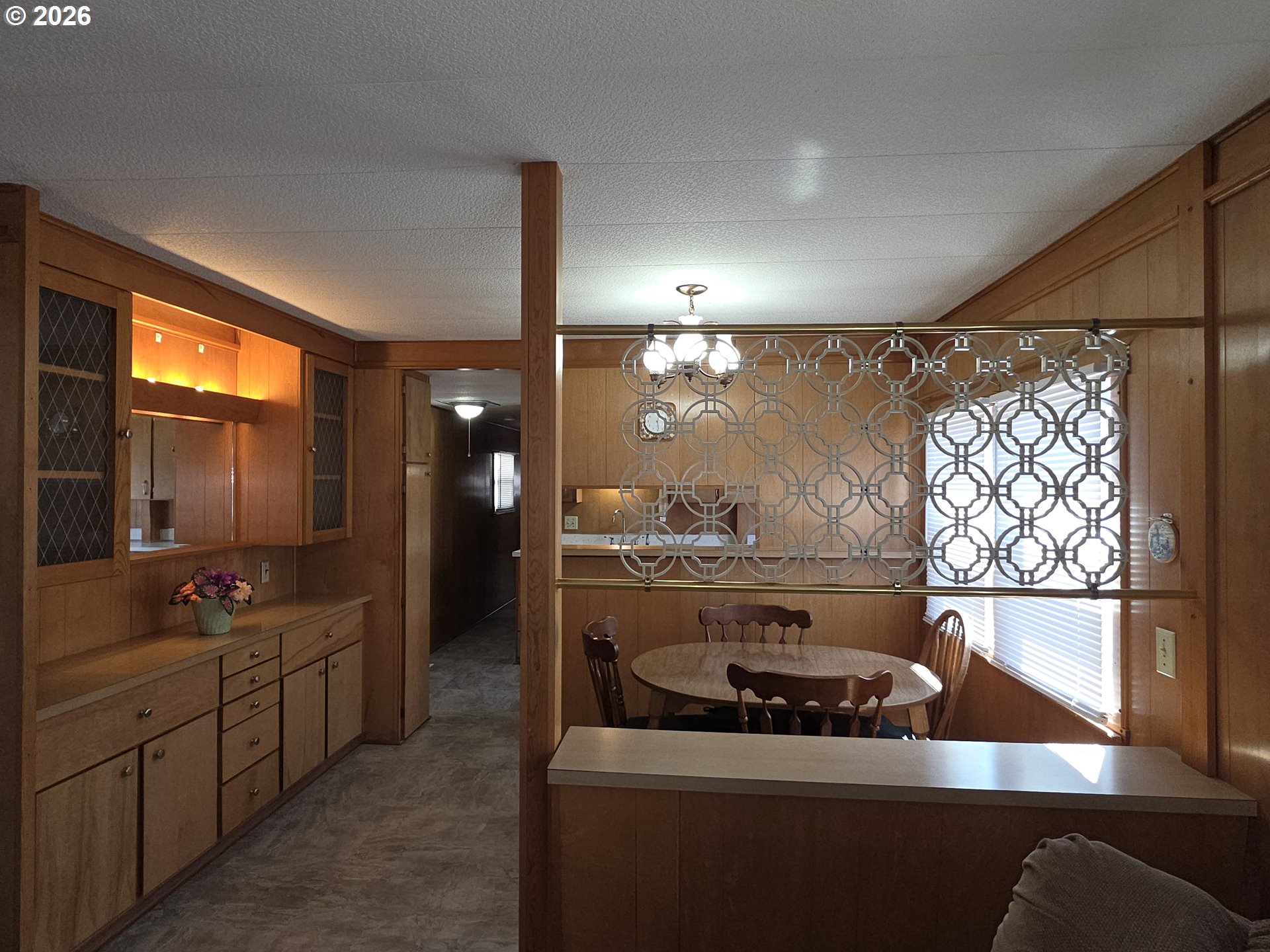 3203 Southeast Vineyard Road, Unit 44 Milwaukie, OR 97267 - Photo 33 of 38 a kitchen with stainless steel appliances a sink stove and refrigerator
