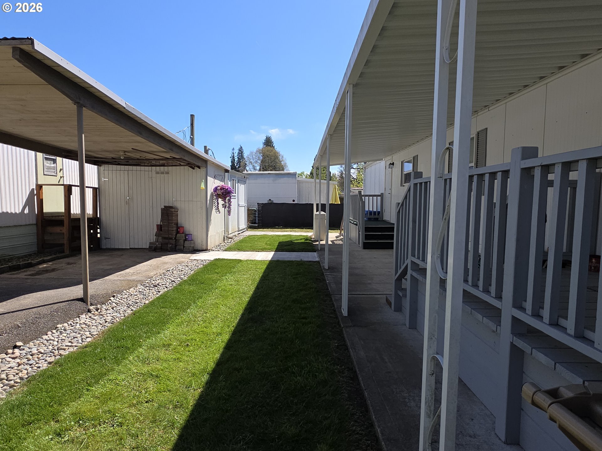 3203 Southeast Vineyard Road, Unit 44 Milwaukie, OR 97267 - Photo 35 of 38 a view of a house with backyard and porch