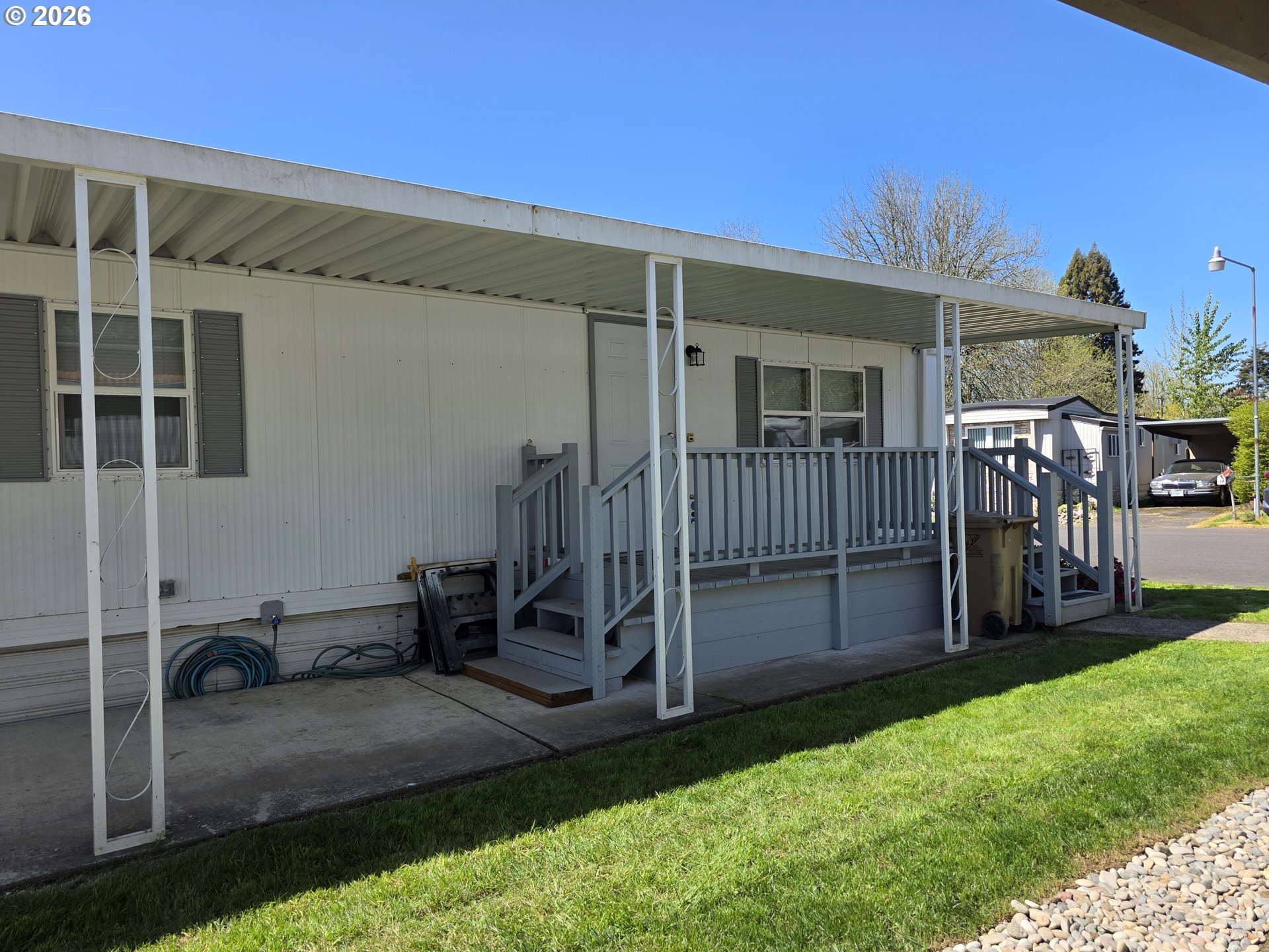 3203 Southeast Vineyard Road, Unit 44 Milwaukie, OR 97267 - Photo 4 of 38 a view of a house with backyard and porch