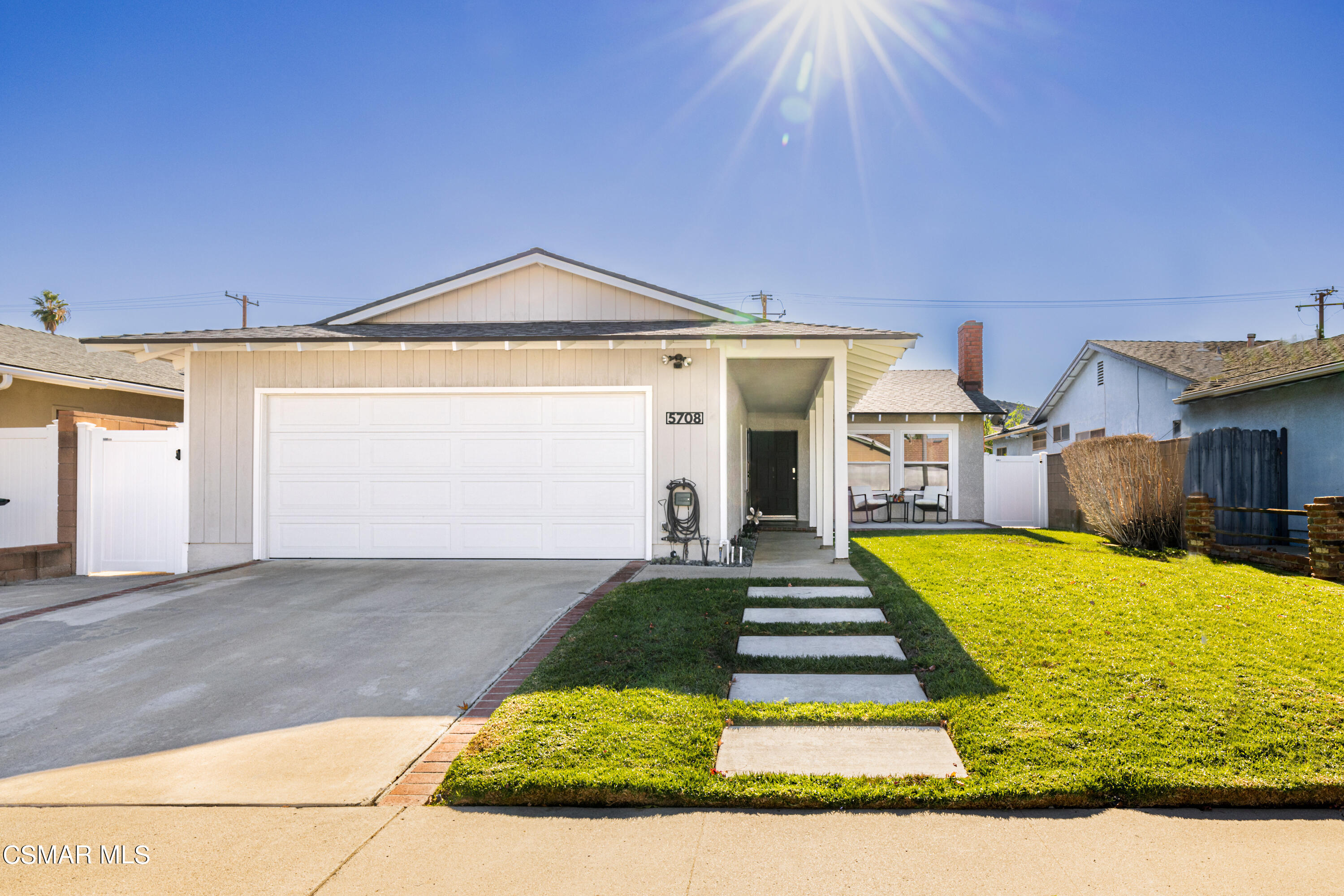 5708 Damon Street Simi Valley, CA 93063 - Photo 1 of 26 a front view of a house with a yard