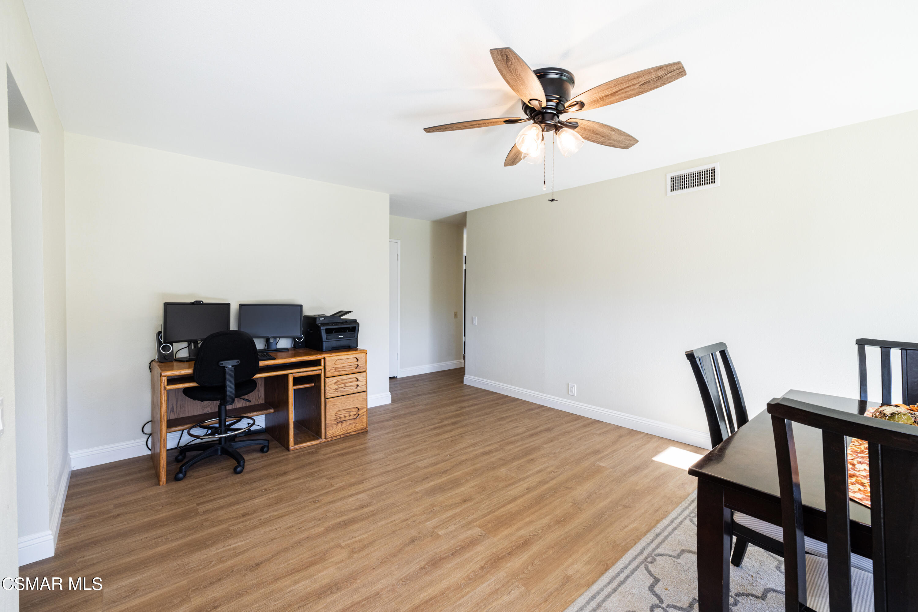 5708 Damon Street Simi Valley, CA 93063 - Photo 12 of 26 a work room with furniture and a wooden floor