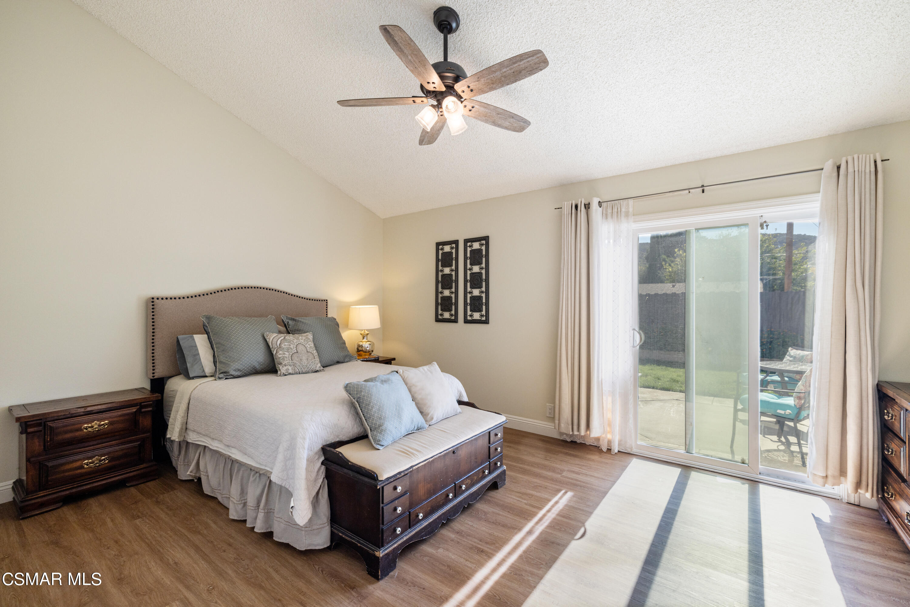 5708 Damon Street Simi Valley, CA 93063 - Photo 14 of 26 a spacious bedroom with a bed and a ceiling fan