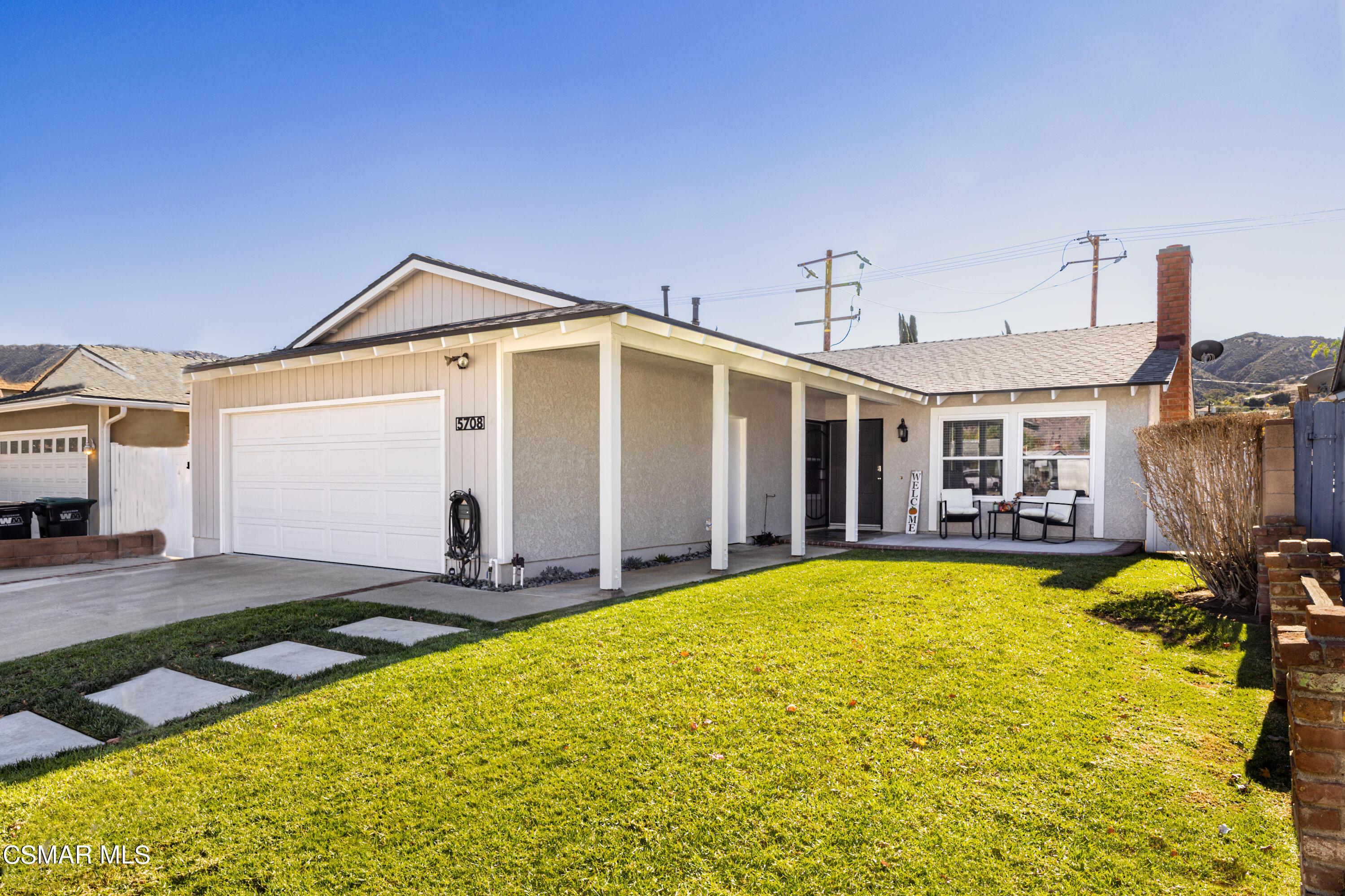 5708 Damon Street Simi Valley, CA 93063 - Photo 2 of 26 a view of a house with swimming pool and sitting area