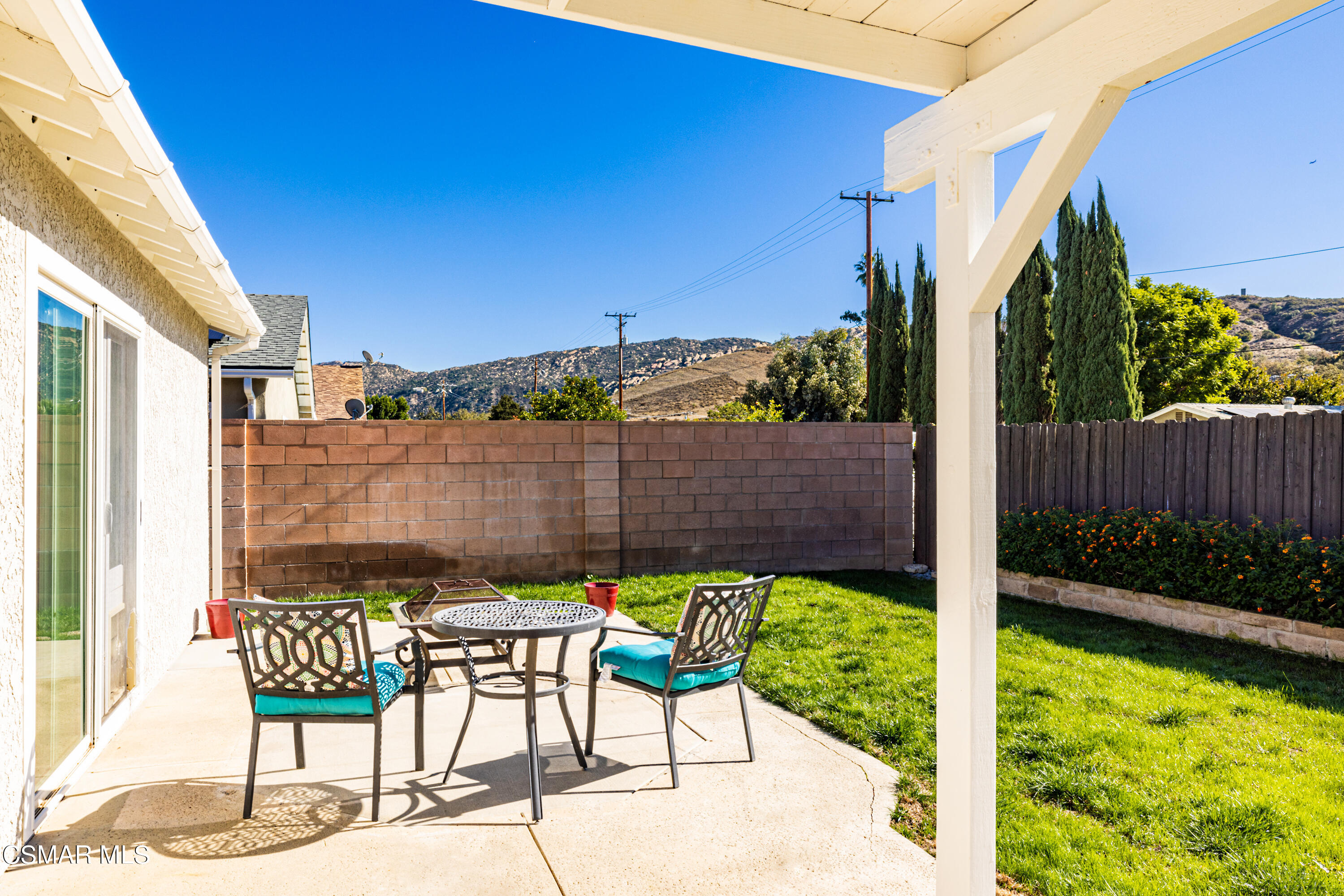 5708 Damon Street Simi Valley, CA 93063 - Photo 23 of 26 a view of an chairs and table in the patio
