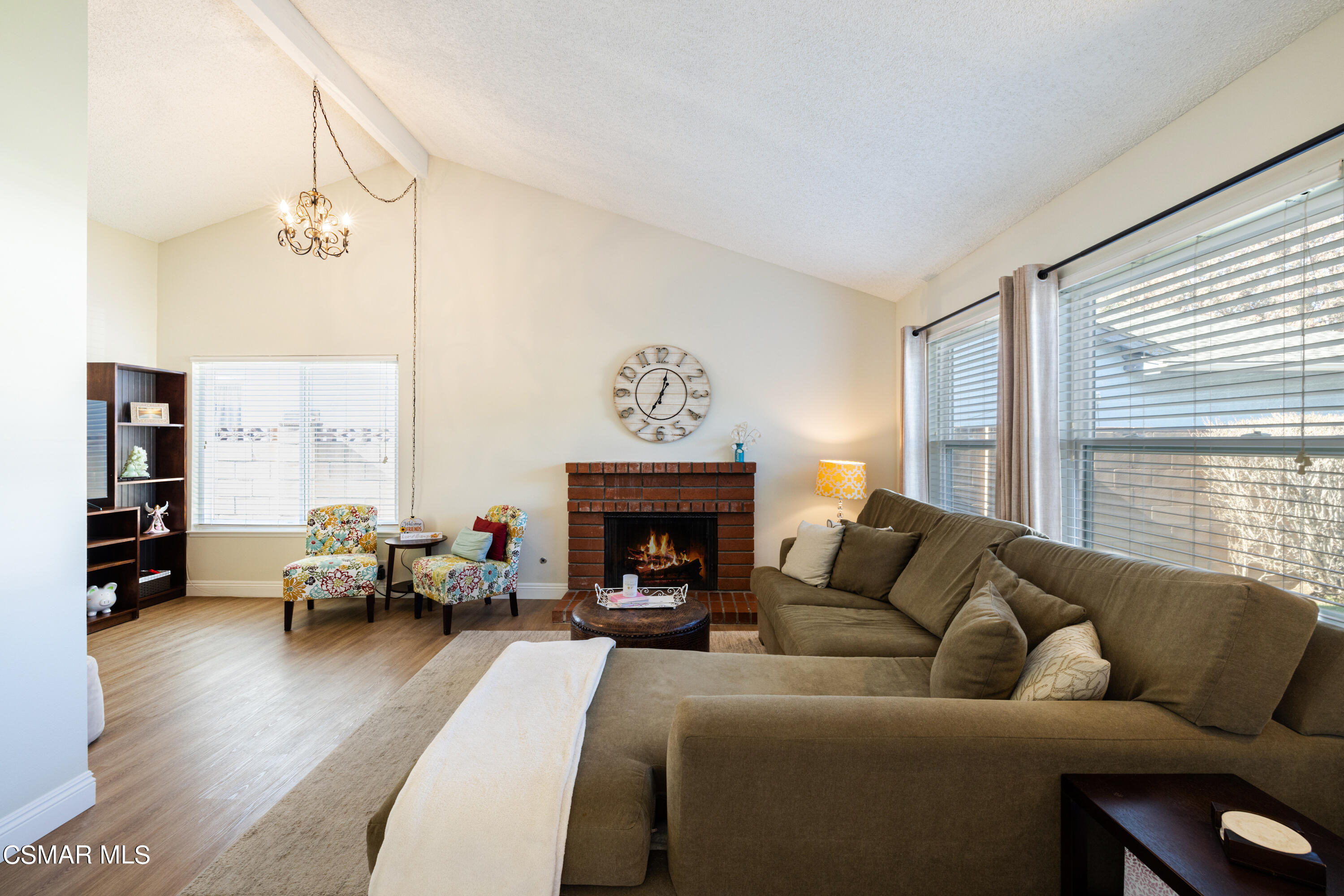 5708 Damon Street Simi Valley, CA 93063 - Photo 6 of 26 a living room with furniture and a fireplace