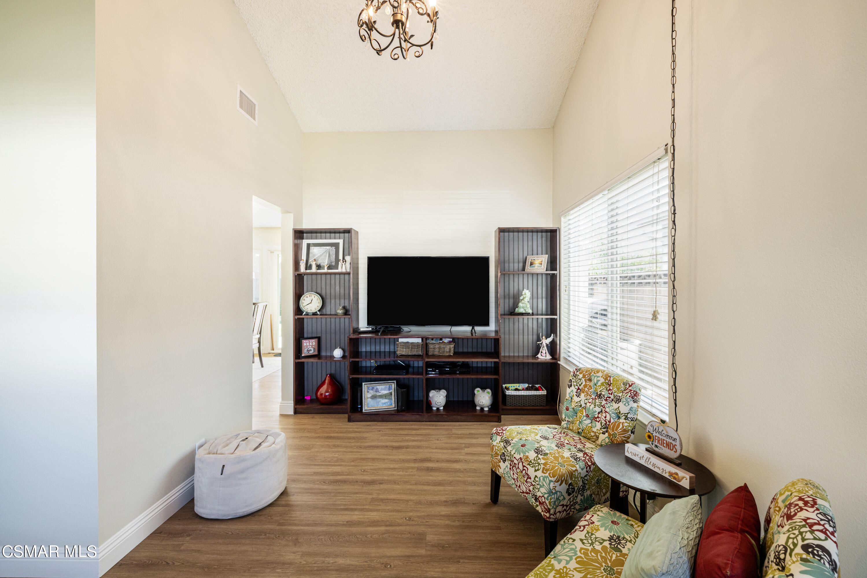 5708 Damon Street Simi Valley, CA 93063 - Photo 7 of 26 a living room with furniture and a flat screen tv
