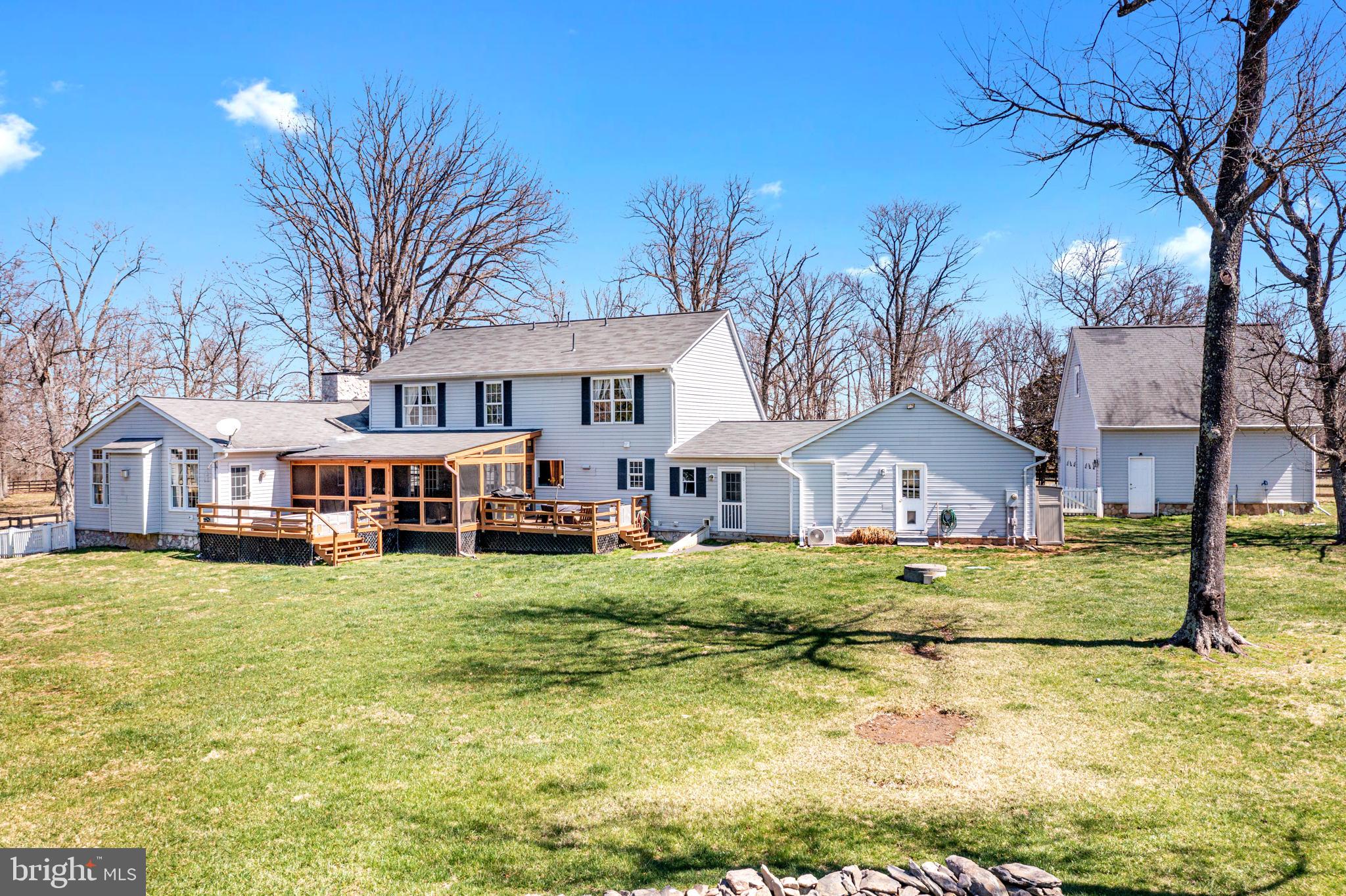 19821 Foggy Bottom Road Bluemont, VA 20135 - Photo 45 of 63 4 SEASON ROOM AND DECK OVERLOOK THE LAWN