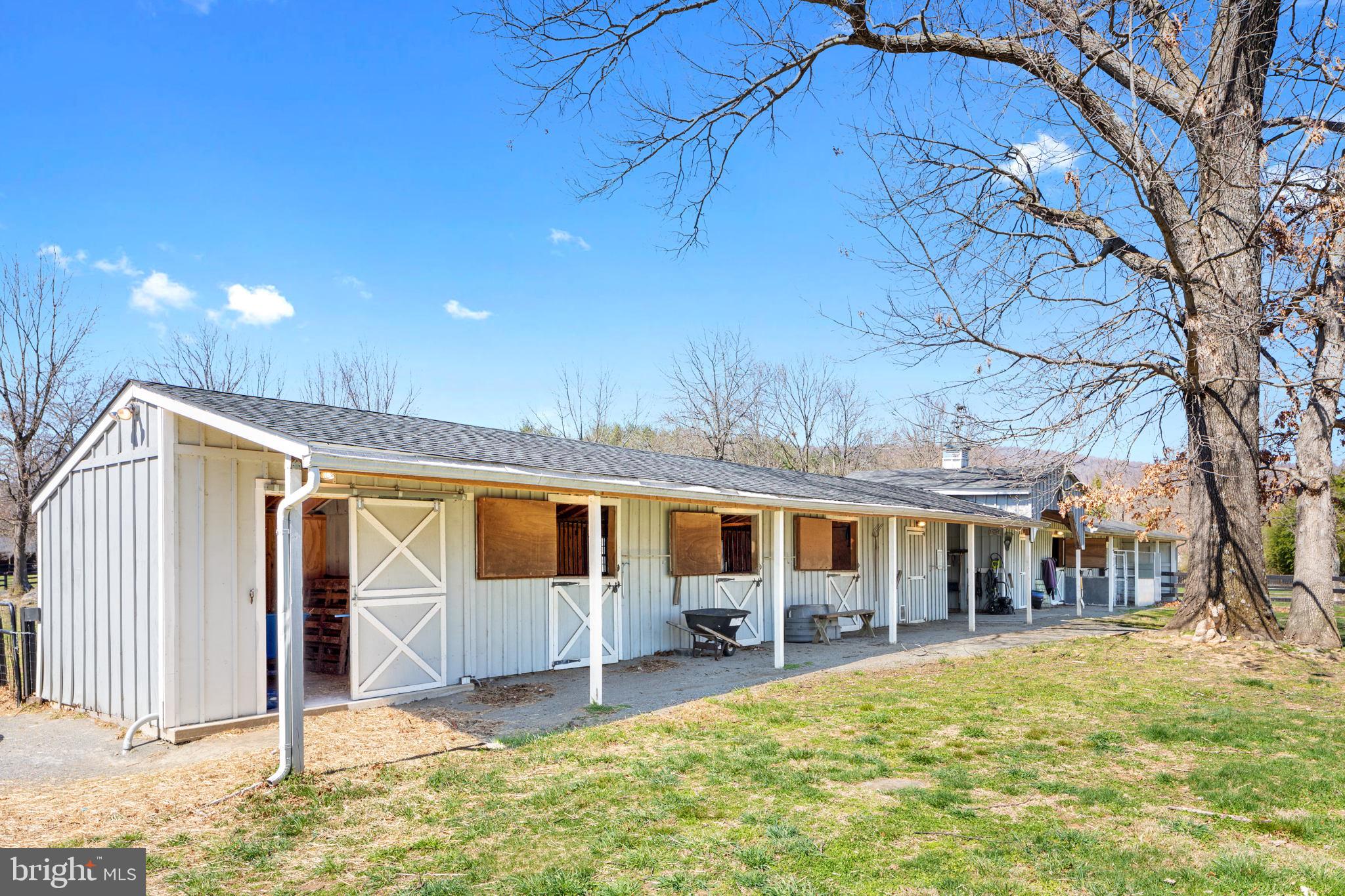 19821 Foggy Bottom Road Bluemont, VA 20135 - Photo 54 of 63 4 STALL BARN WITH LEAN TO COVER & LIGHTS