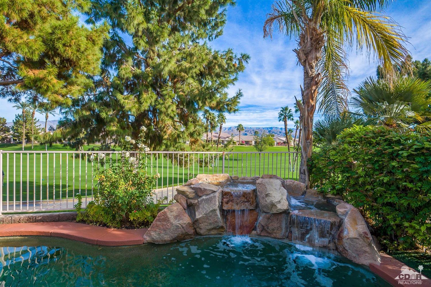 39515 Manorgate Road Palm Desert, CA 92211 - Photo 3 of 42 a view of a garden with an ocean view