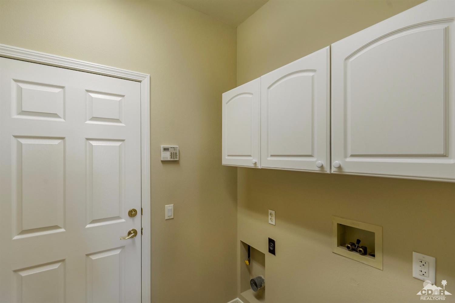 39515 Manorgate Road Palm Desert, CA 92211 - Photo 31 of 42 a view of cabinets