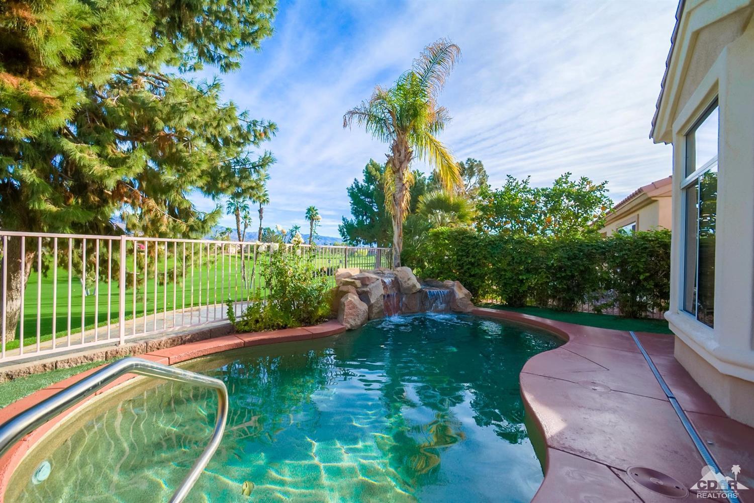 39515 Manorgate Road Palm Desert, CA 92211 - Photo 36 of 42 a view of a backyard with a garden