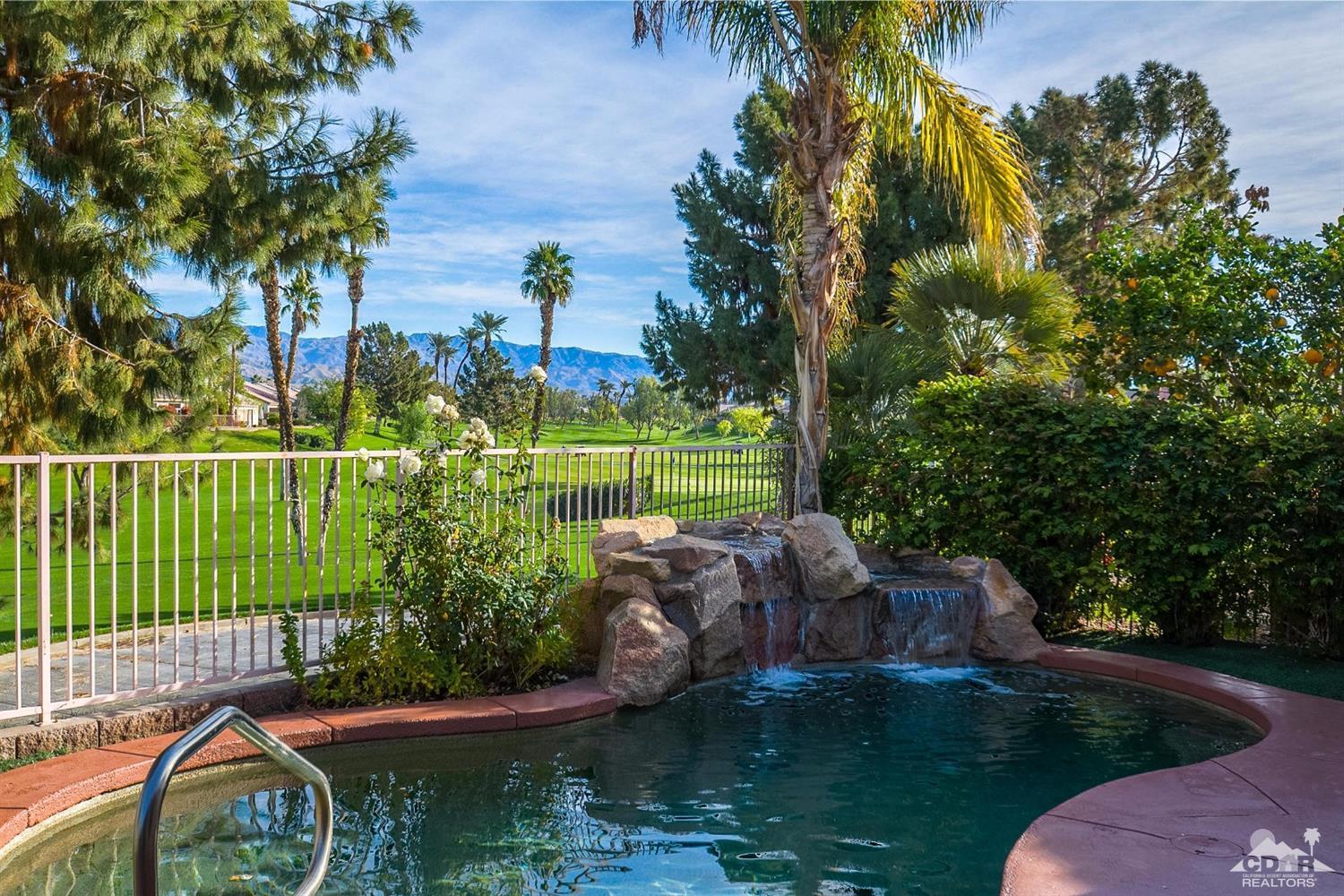 39515 Manorgate Road Palm Desert, CA 92211 - Photo 37 of 42 a garden view with a seating space