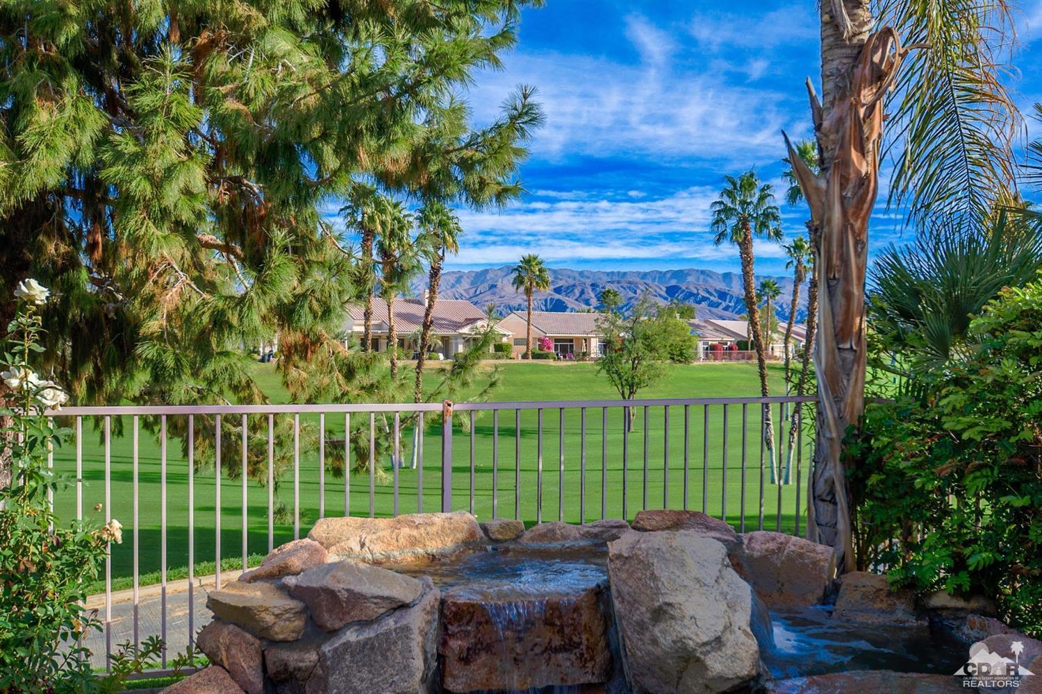 39515 Manorgate Road Palm Desert, CA 92211 - Photo 38 of 42 a view of a backyard with sitting area and garden