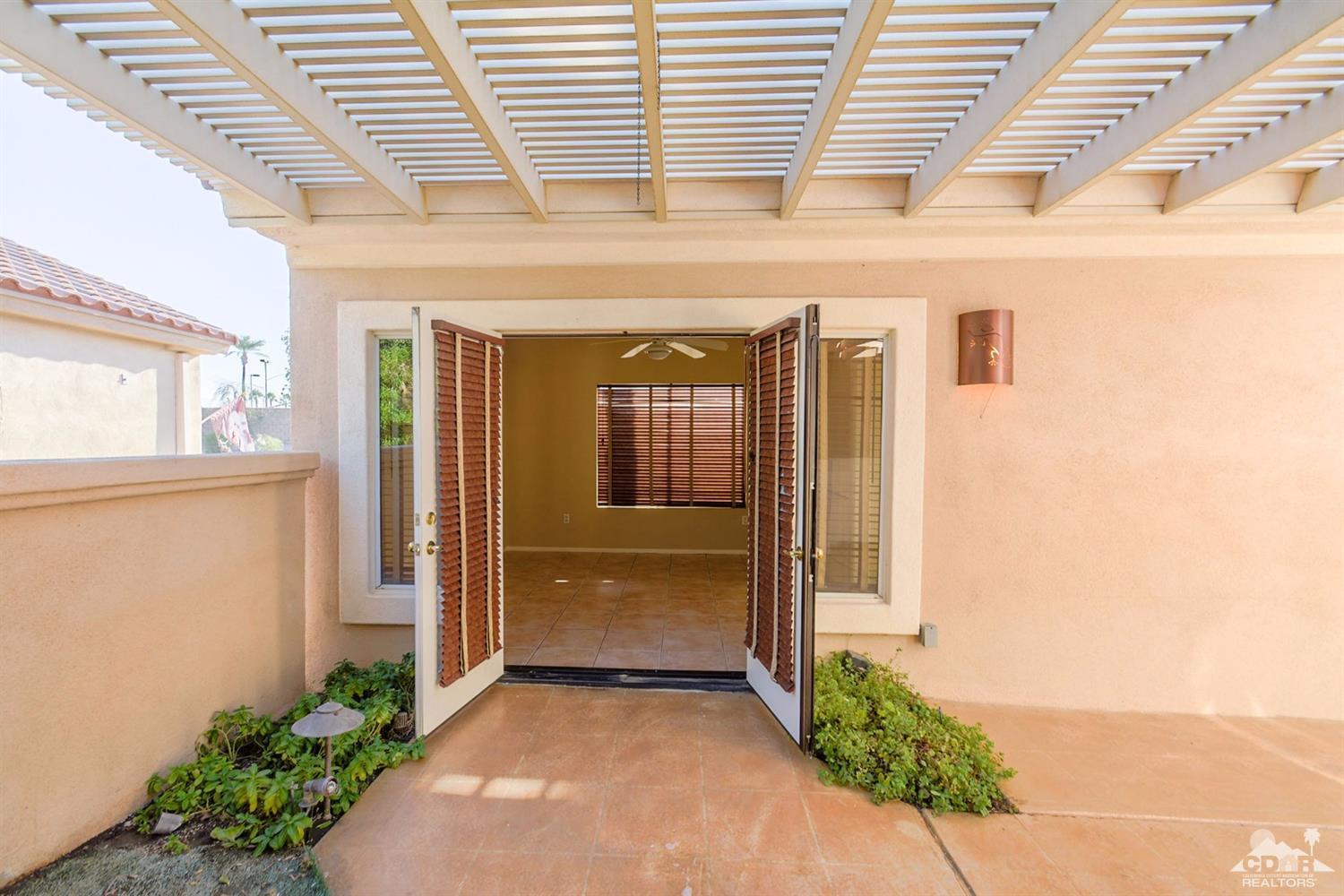 39515 Manorgate Road Palm Desert, CA 92211 - Photo 10 of 42 a view of a entryway of a house