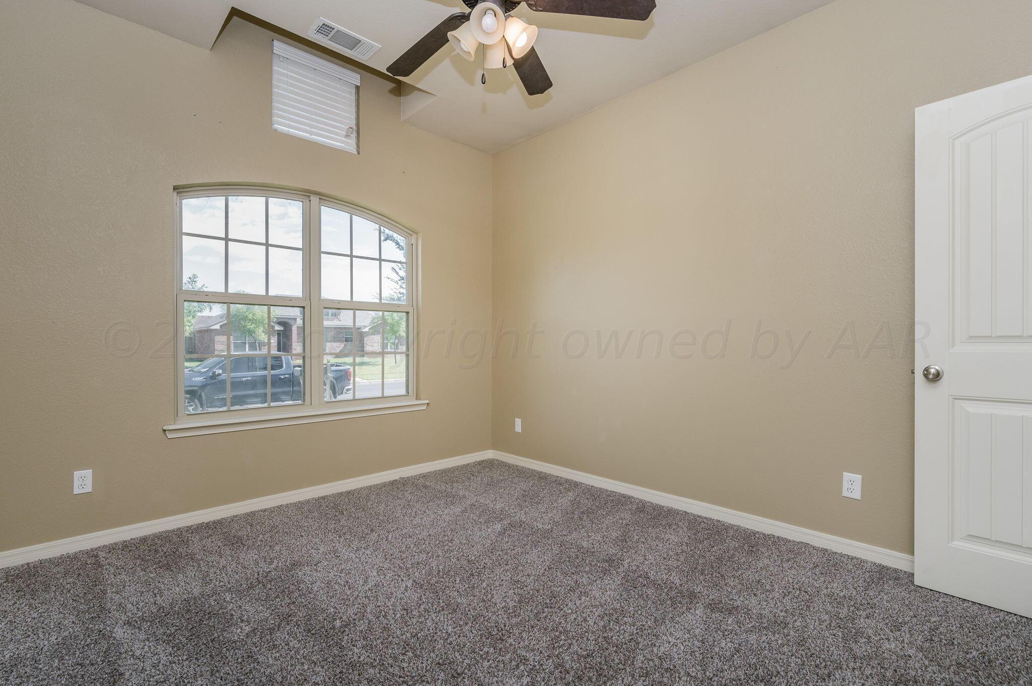 3601 Springfield Avenue Amarillo, TX 79118 - Photo 17 of 26 an empty room with a window