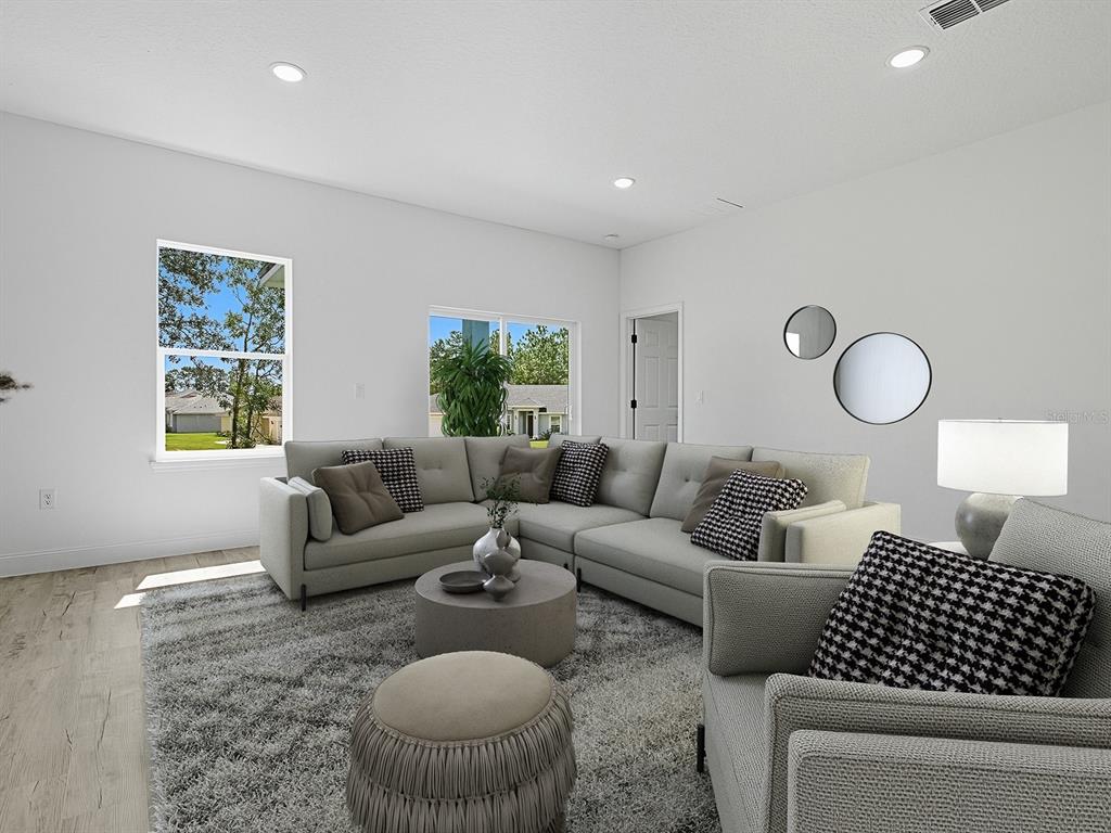 13322 Southwest 85th Circle Ocala, FL 34473 - Photo 19 of 27 a living room with furniture