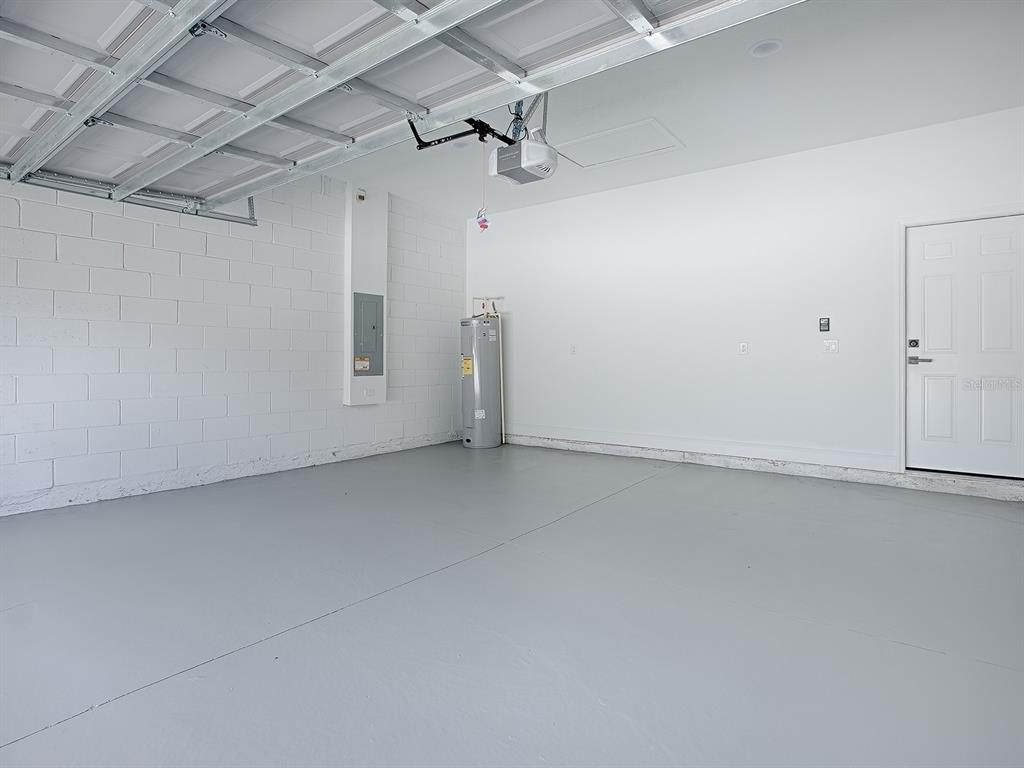 13322 Southwest 85th Circle Ocala, FL 34473 - Photo 26 of 27 a view of a room with racks on the wall