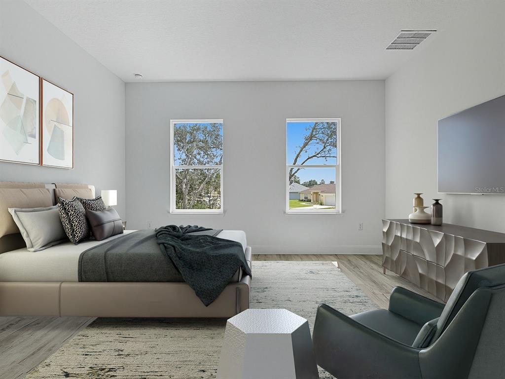 13322 Southwest 85th Circle Ocala, FL 34473 - Photo 7 of 27 a living room with furniture and a window