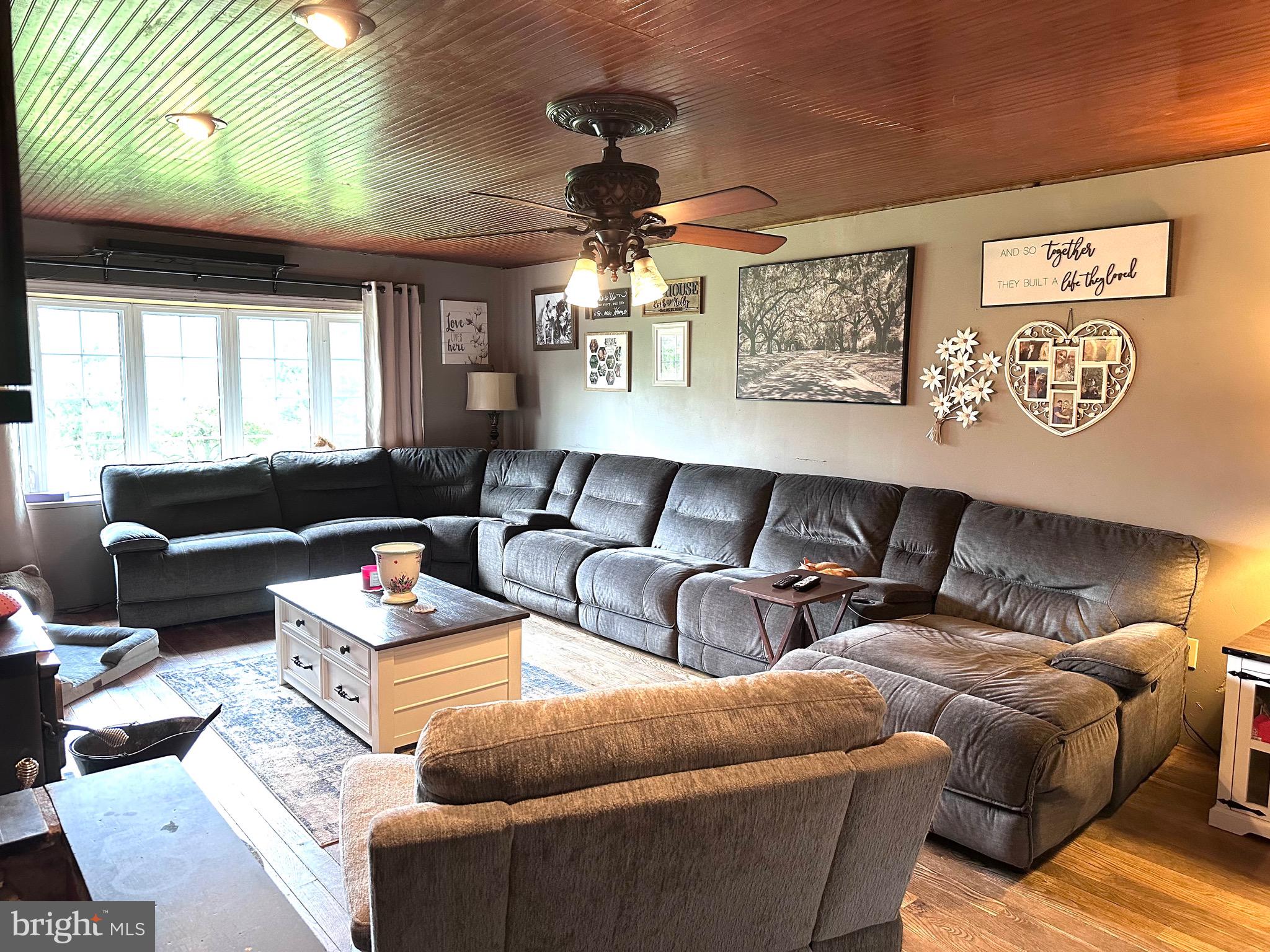 107 Jalappa Road Hamburg, PA 19526 - Photo 12 of 42 a living room with furniture and a large window