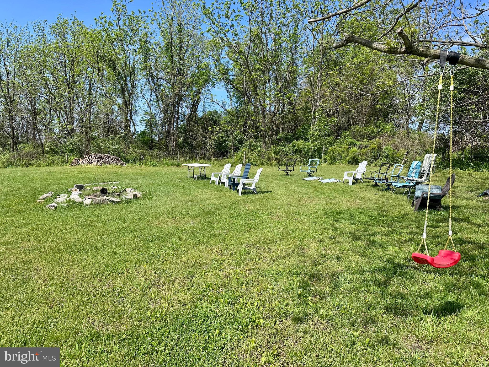 107 Jalappa Road Hamburg, PA 19526 - Photo 37 of 42 a backyard of a house with table and chairs