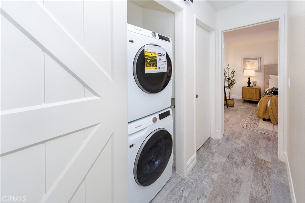 27668 Haskell Canyon Road, Unit H Saugus, CA 91350 - Photo 11 of 18 a view of living room washer and dryer