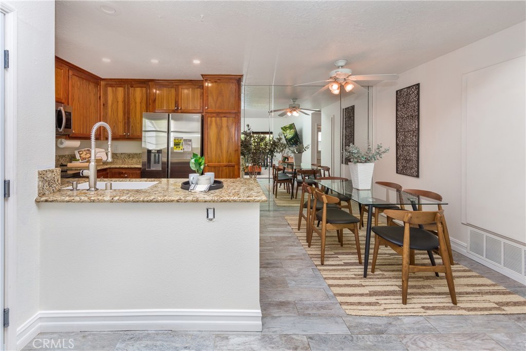 27668 Haskell Canyon Road, Unit H Saugus, CA 91350 - Photo 3 of 18 a kitchen with counter top space cabinets and appliances