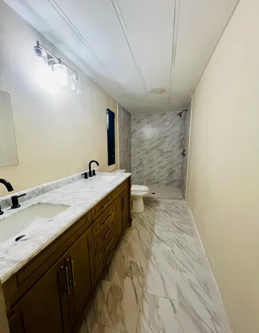 a view of a livingroom with wooden floor