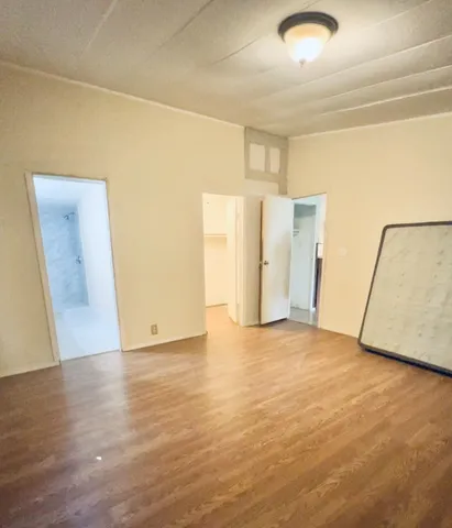 a view of an house with backyard space and garden