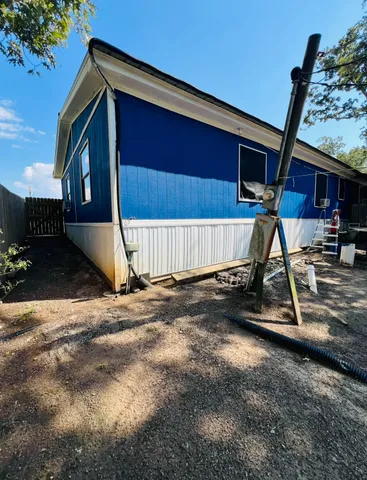 a view of a house with a patio