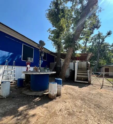 a view of a park with swings and slides