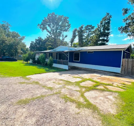 a view of a backyard with a small pool