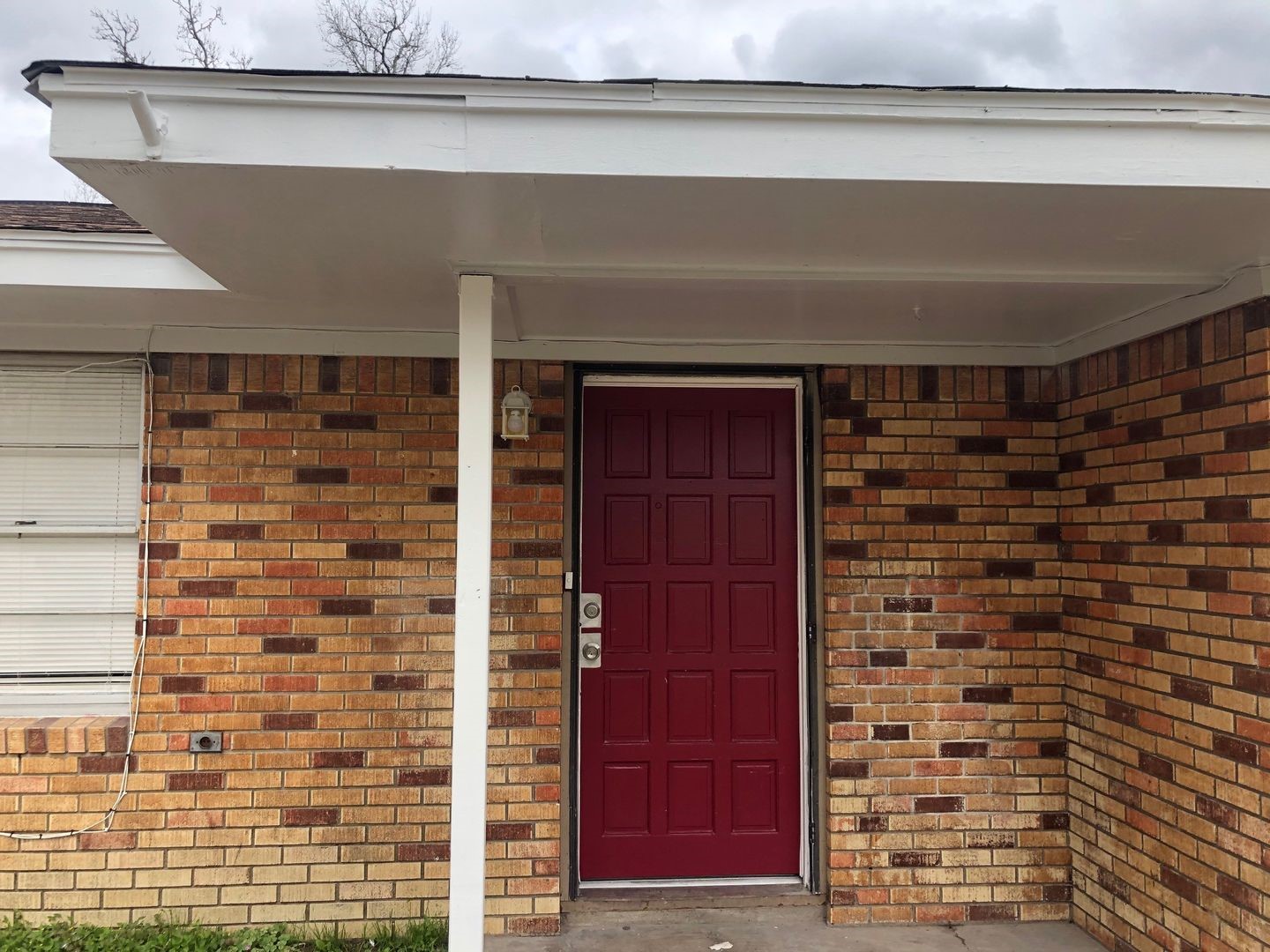 a bathroom with a shower and a mirror