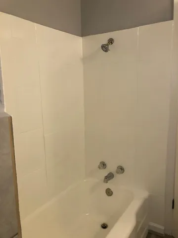 a bathroom with a bathtub