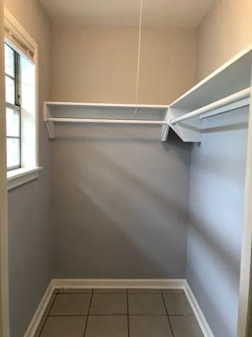 a view of a room with rack on the wall