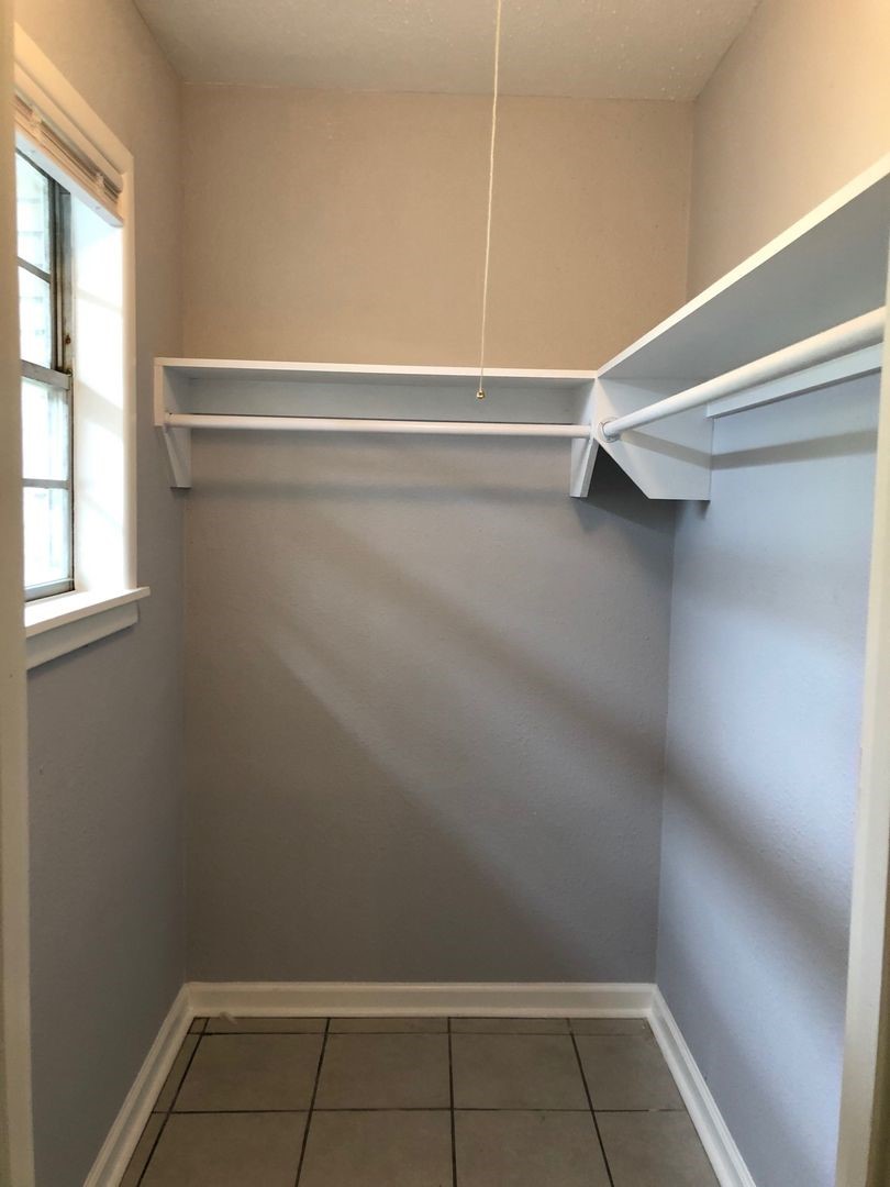 503 Willow Avenue Cleveland, TX 77327 - Photo 14 of 17 a view of a room with rack on the wall