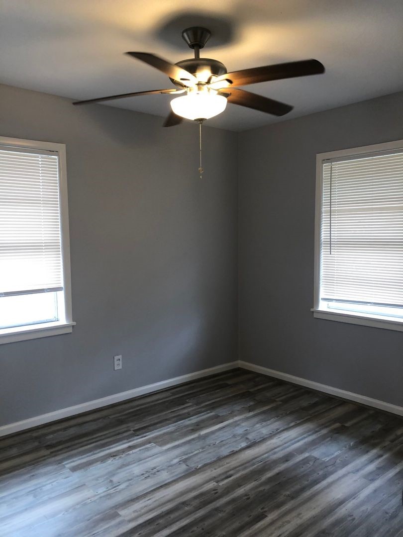 503 Willow Avenue Cleveland, TX 77327 - Photo 8 of 17 a view of room with window and ceiling fan
