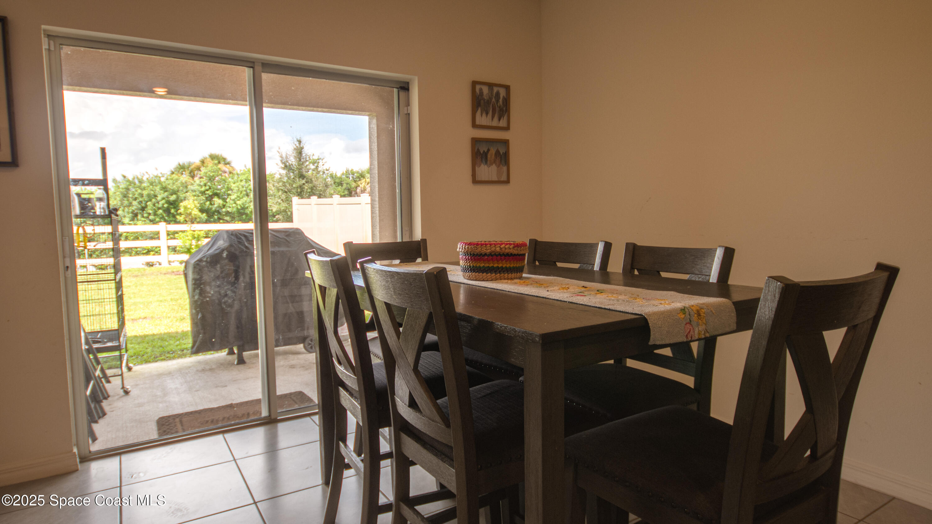 913 Trinity Street Rockledge, FL 32955 - Photo 11 of 25 a view of a dining room with furniture window and outside view