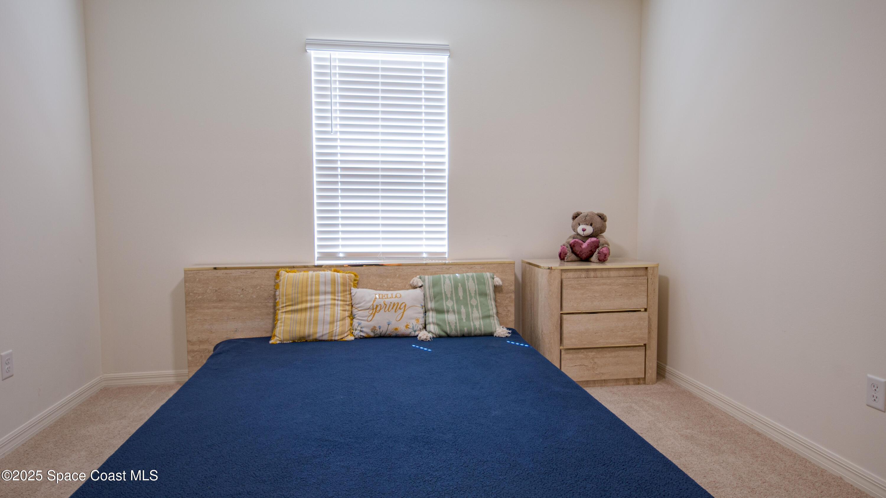 913 Trinity Street Rockledge, FL 32955 - Photo 20 of 25 a room with toys and a window