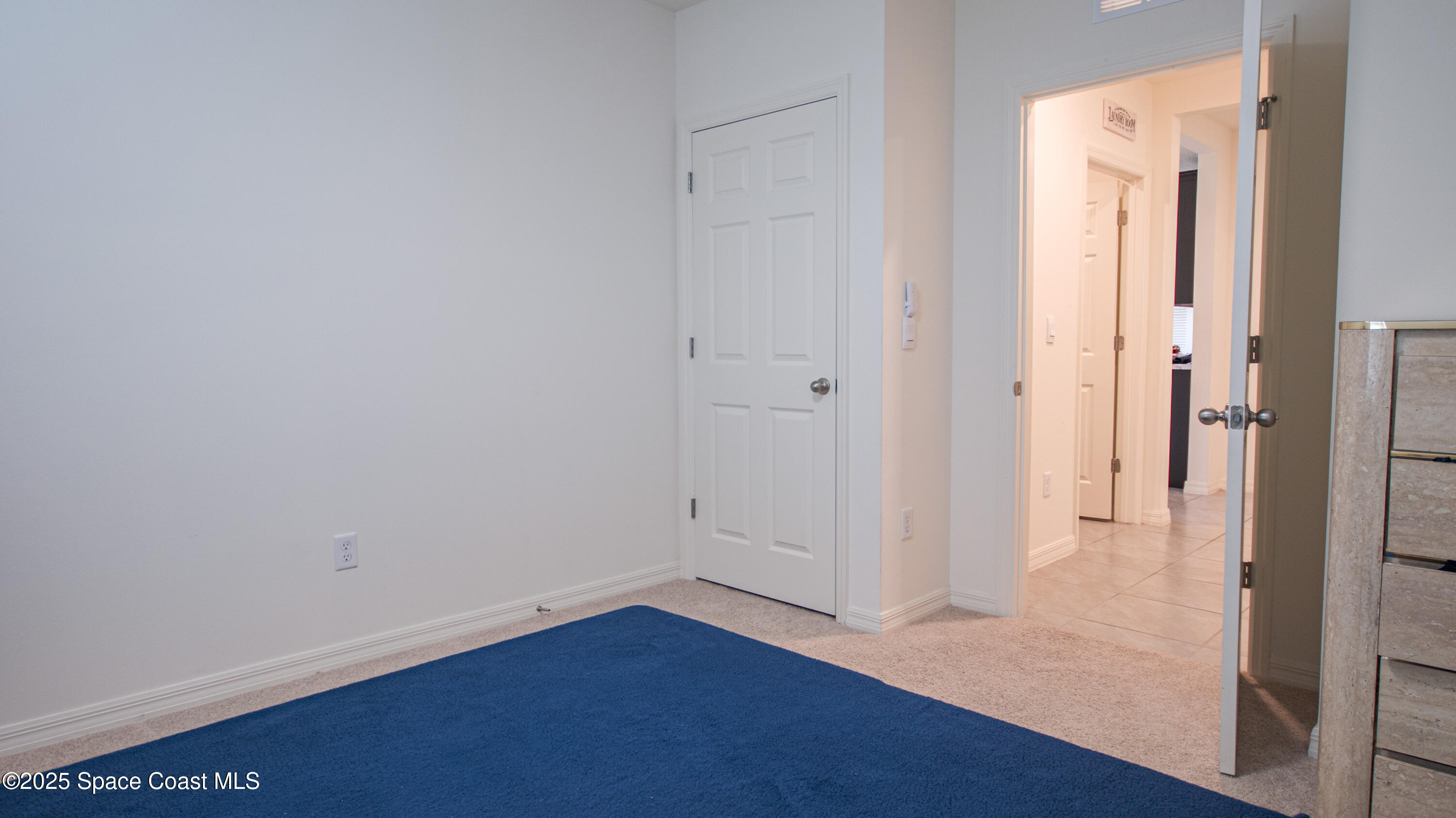 913 Trinity Street Rockledge, FL 32955 - Photo 21 of 25 a view of a hallway with wooden floor