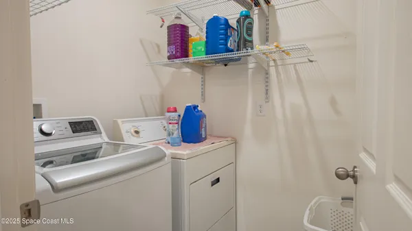 a view of storage and utility room
