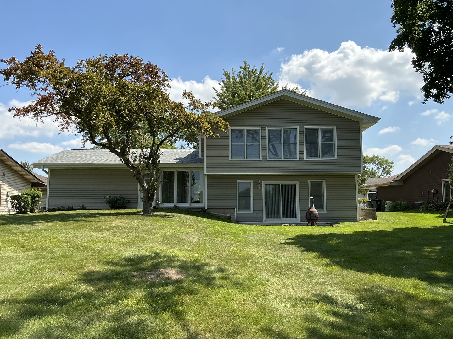 1930 North Lakeside Plaza Hoffman Estates, IL 60169 - Photo 14 of 15 a front view of house with yard and green space