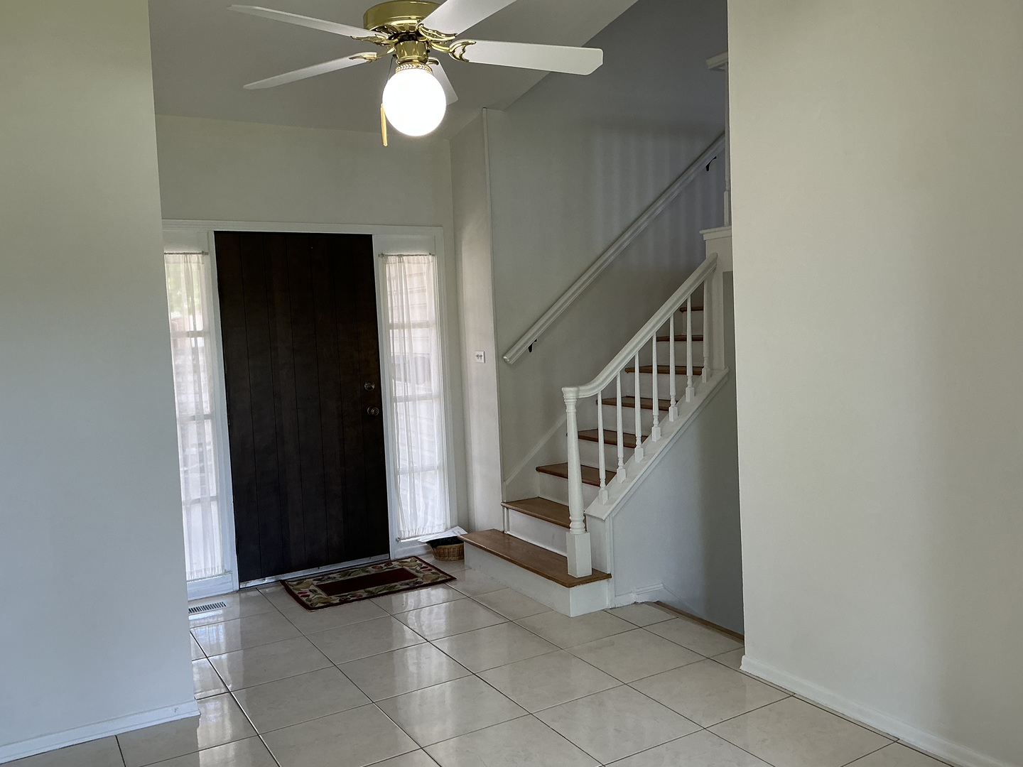 1930 North Lakeside Plaza Hoffman Estates, IL 60169 - Photo 2 of 15 a view of an entryway with wooden floor and staircase