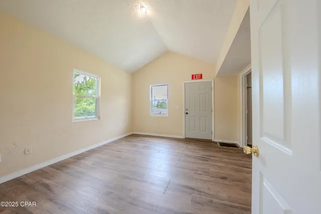 a bathroom with a toilet sink and shower