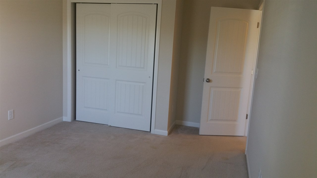 1237 Silver Beach Way Raleigh, NC 27606 - Photo 16 of 20 One of 2 additional bedrooms. Both are spacious. Bedroom