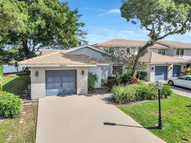 $525,000 | 3143 Deer Creek Lake Shore Drive, Unit 3143, Deerfield Beach, FL 33442