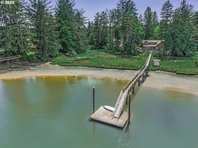 a view of a swimming pool with a yard