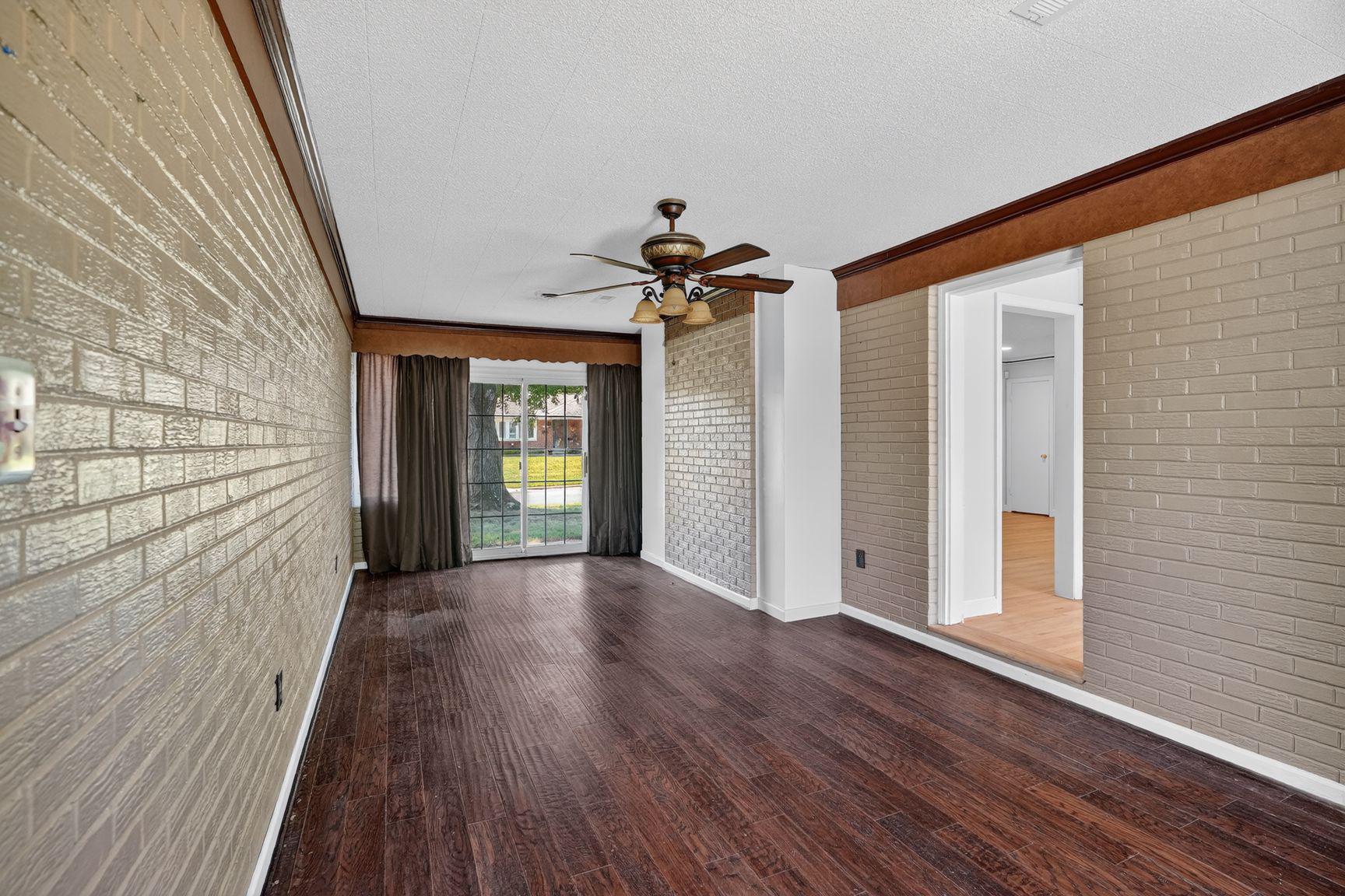 4202 Yates Road Beltsville, MD 20705 - Photo 8 of 31 Family room off kitchen opens on to front patio.